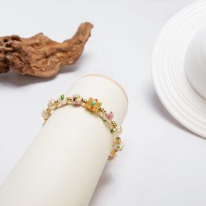 WHITE LOTUS - 7mm - 3 Spiritual White Lotus bracelet – A 7mm Cloisonné bracelet with intricate lotus and prayer wheel motifs, offering a blessing of harmony and well-being.