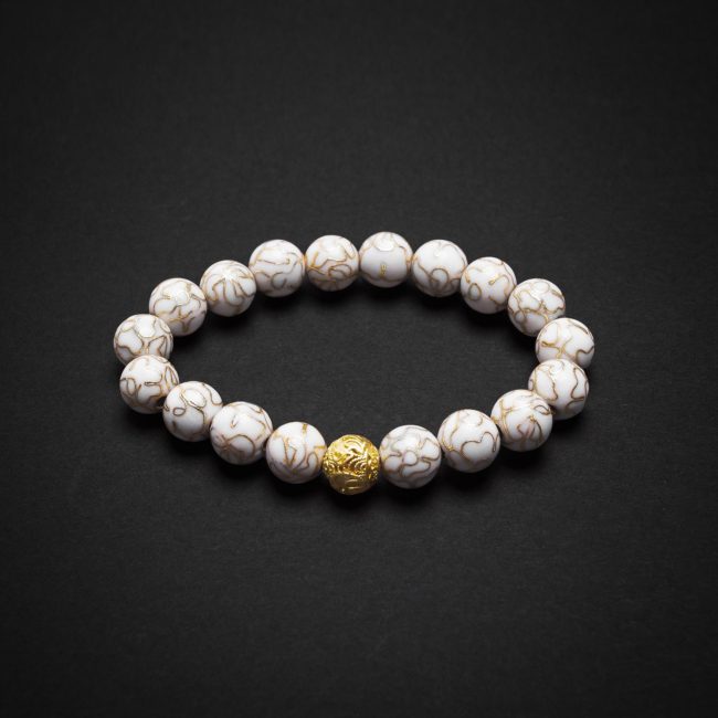 Moonlight Cloisonné bracelet – A white handcrafted bracelet with intricate silver detailing, inspired by the serene glow of the moon and celestial beauty.