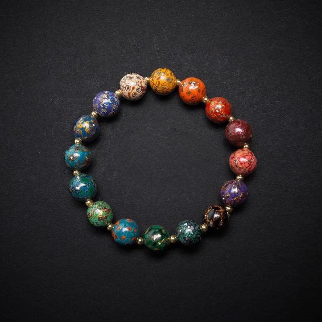 Handmade lacquer bracelet – A stunning multi-colored beaded bracelet crafted using heritage jewelry techniques, merging Asian artistry with a modern minimalist aesthetic.