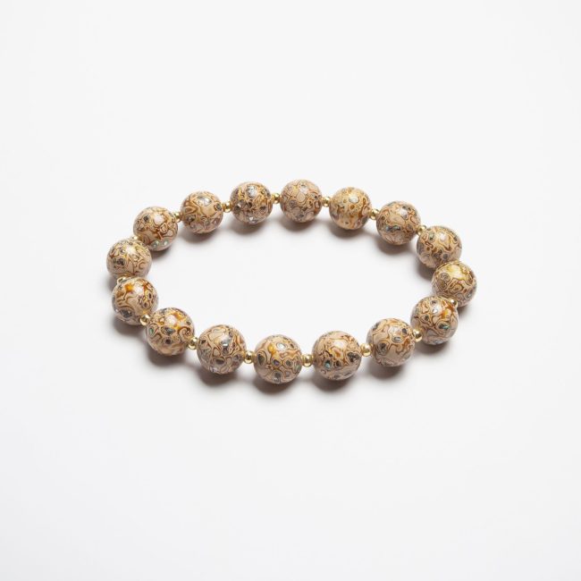 Saturn - 10mm -1 Saturn lacquer bracelet – A luxurious beige lacquer bangle, handcrafted using traditional Chinese lacquerware techniques, embodying sophistication and elegance.