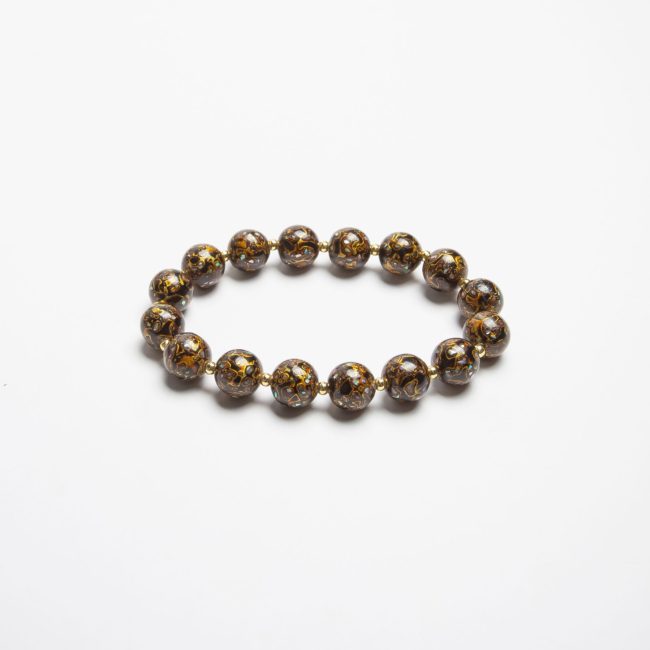 Obsidian lacquer bracelet – A minimalist black lacquer bangle, handcrafted using traditional Chinese lacquerware techniques, exuding sophistication and timeless elegance.