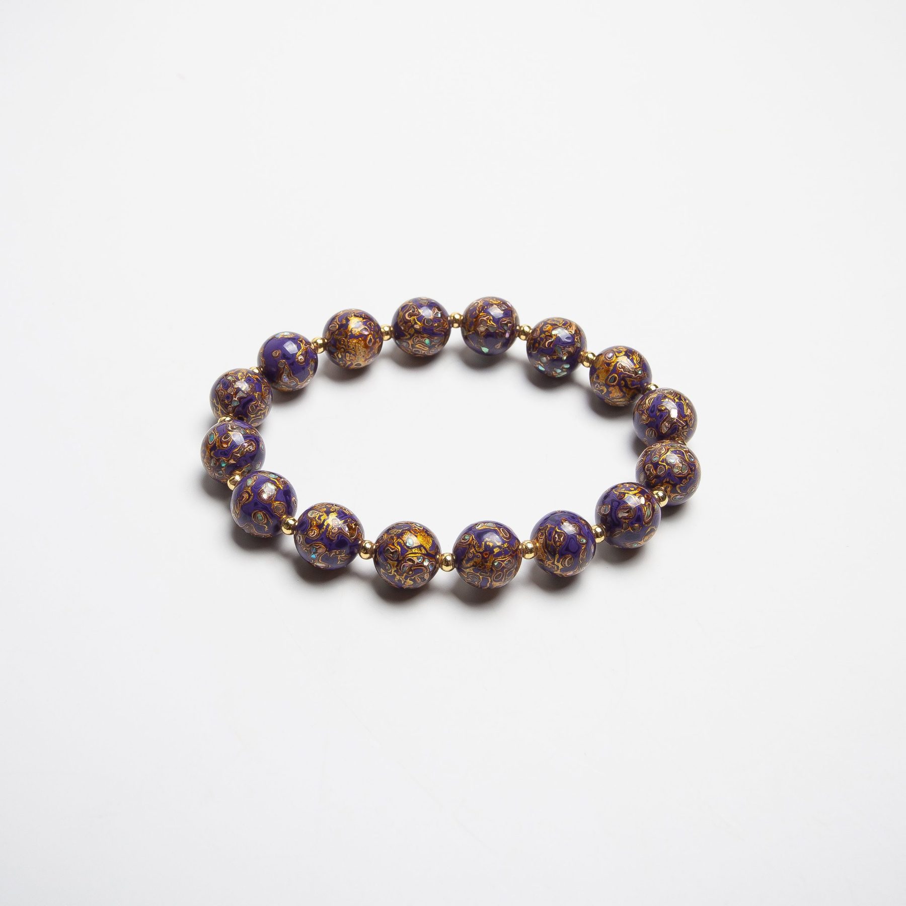 Star Dust lacquer bracelet – A deep purple handcrafted lacquer bangle, inspired by the mysteries of the cosmos, blending heritage jewelry craftsmanship with celestial elegance.